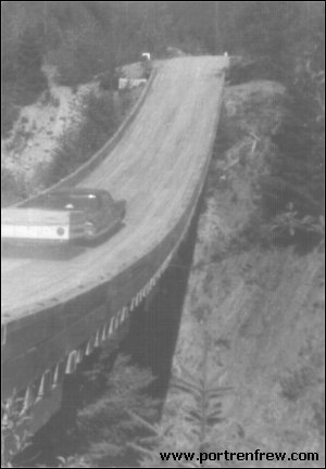 image of wooden car suspension bridge over bear creek